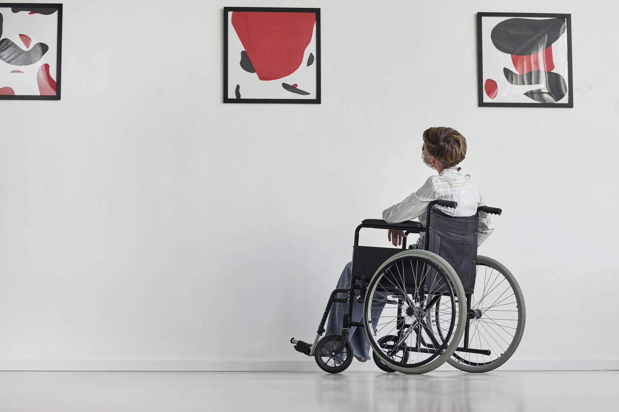 Disabled Woman Visiting Art Museum