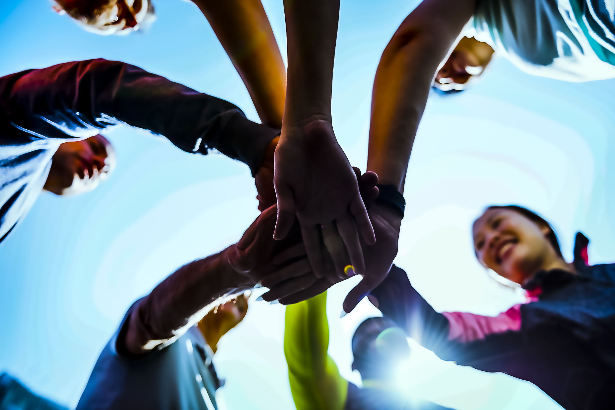 diverse-people-joined-hands-together-2021-08-27-00-05-50-utc