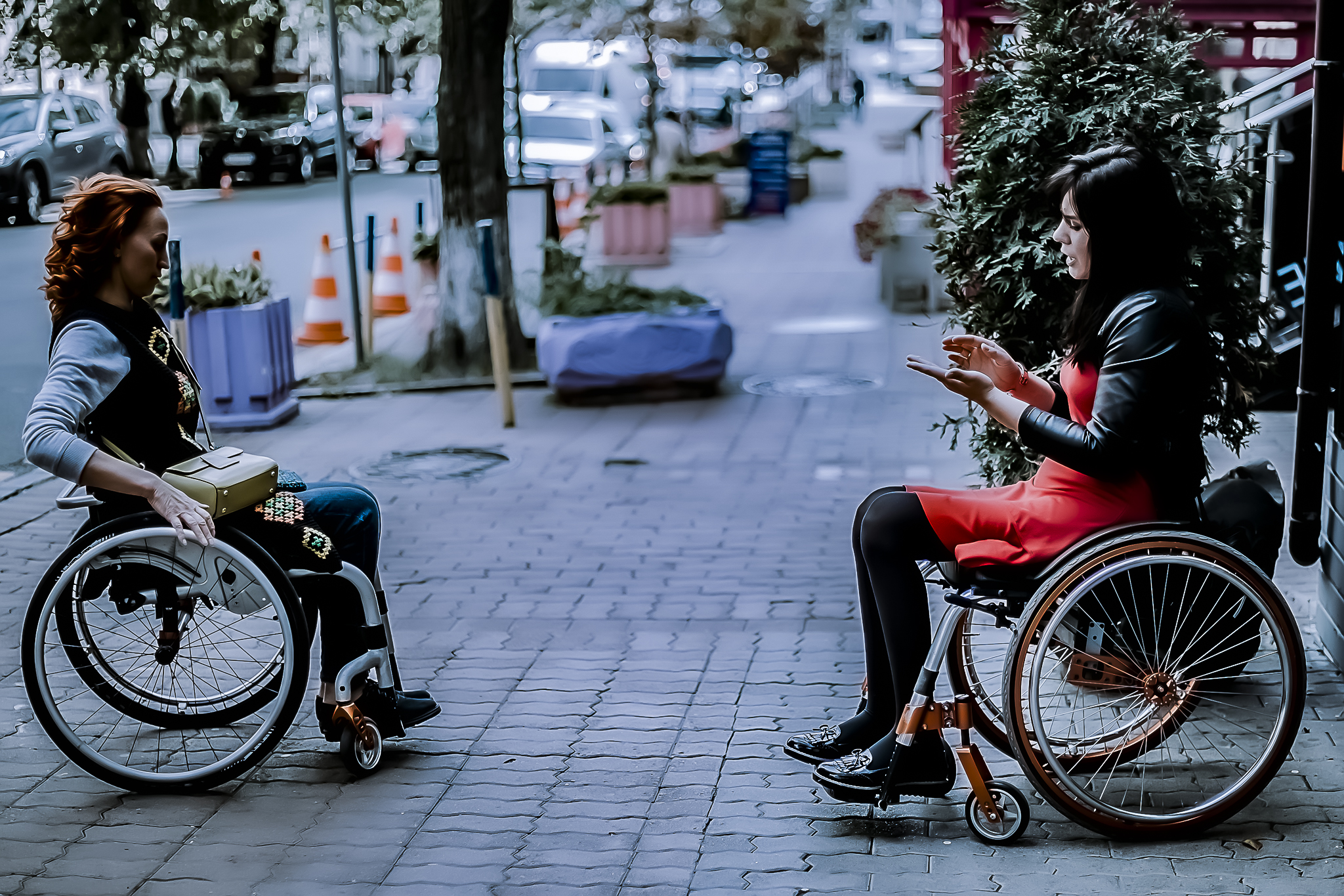 two-girls-in-wheelchairs-travel-through-the-centra-2021-12-03-19-45-07-utc